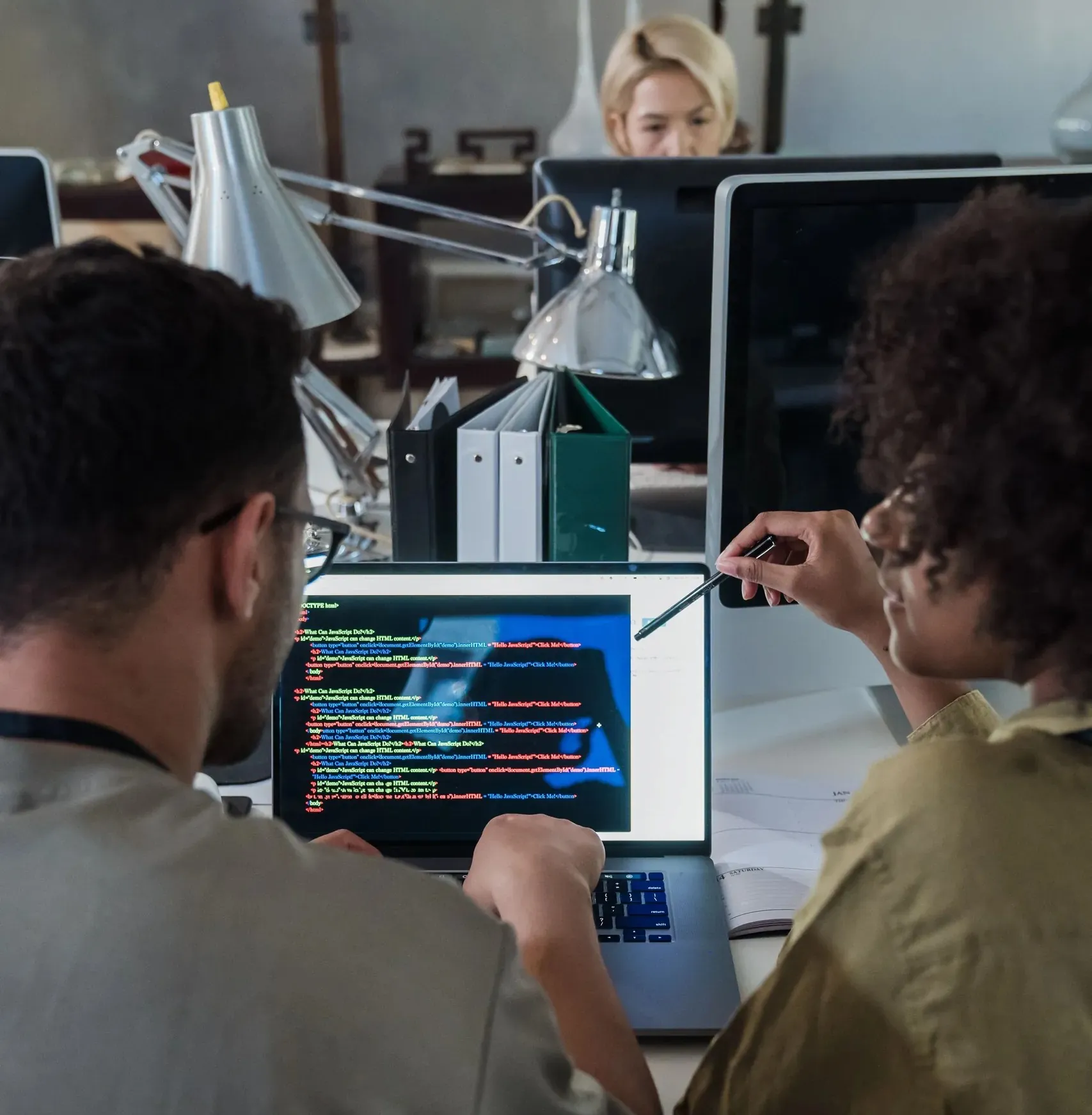 The Solinovo team gathered around one screen during a sprint demo.